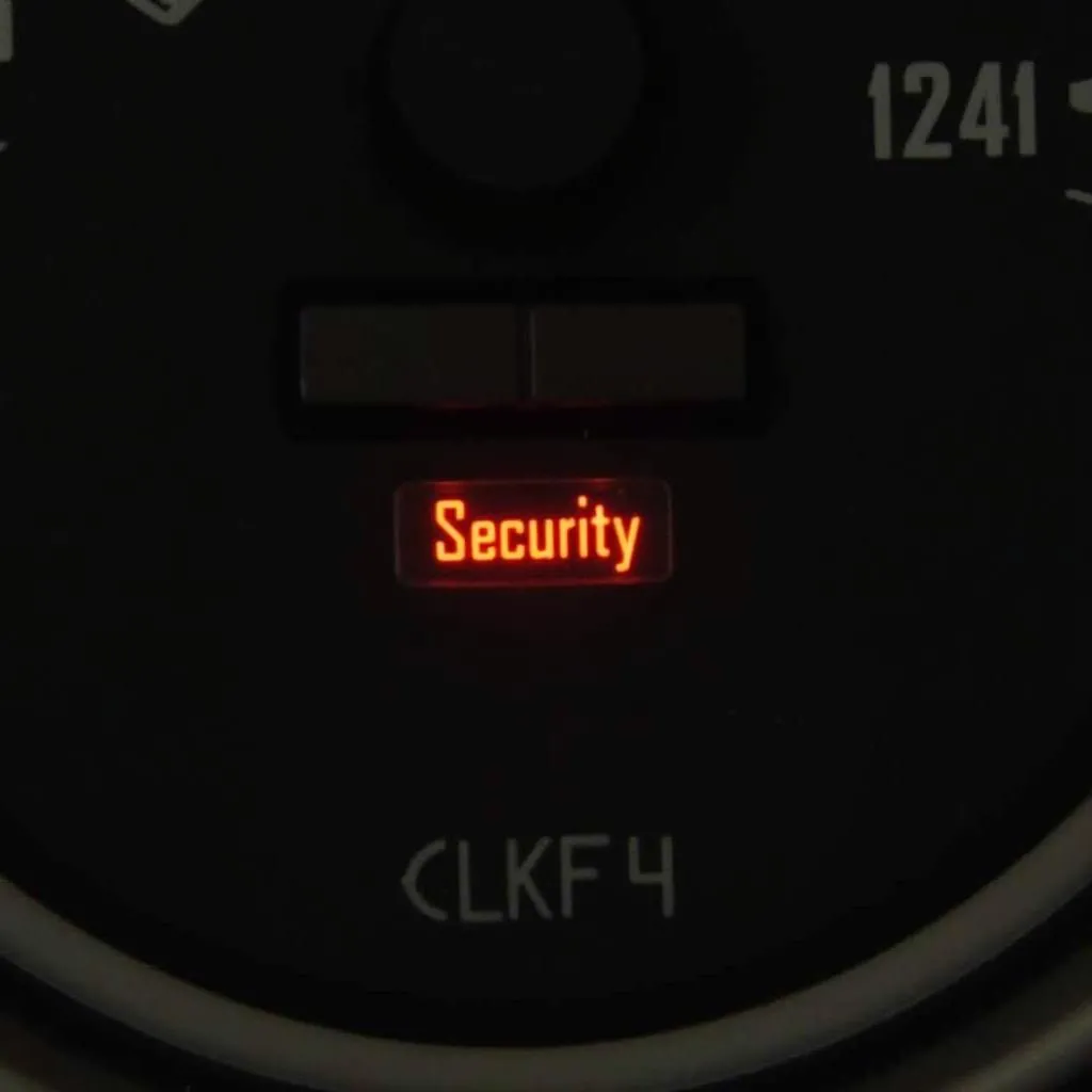 Car dashboard with security light illuminated