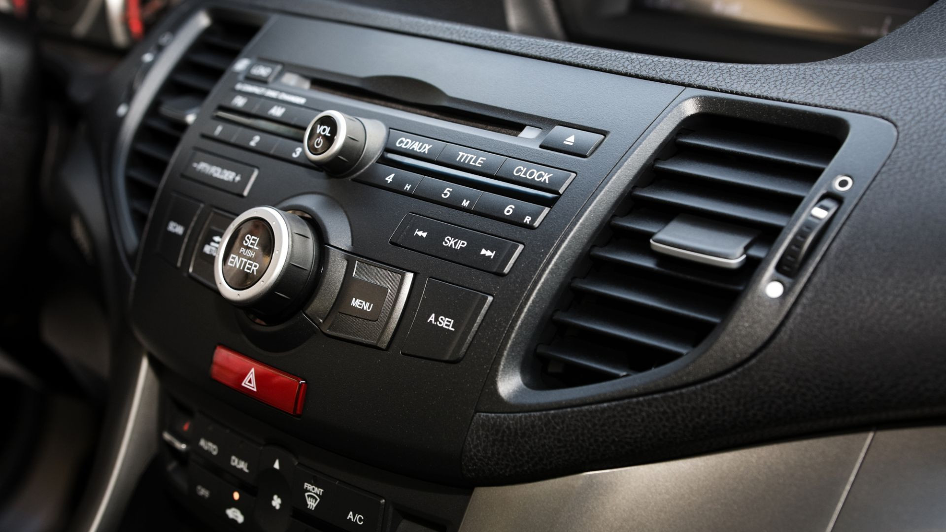 Car heater vents, showcasing the dashboard outlets through which warm air is circulated into the vehicle cabin.