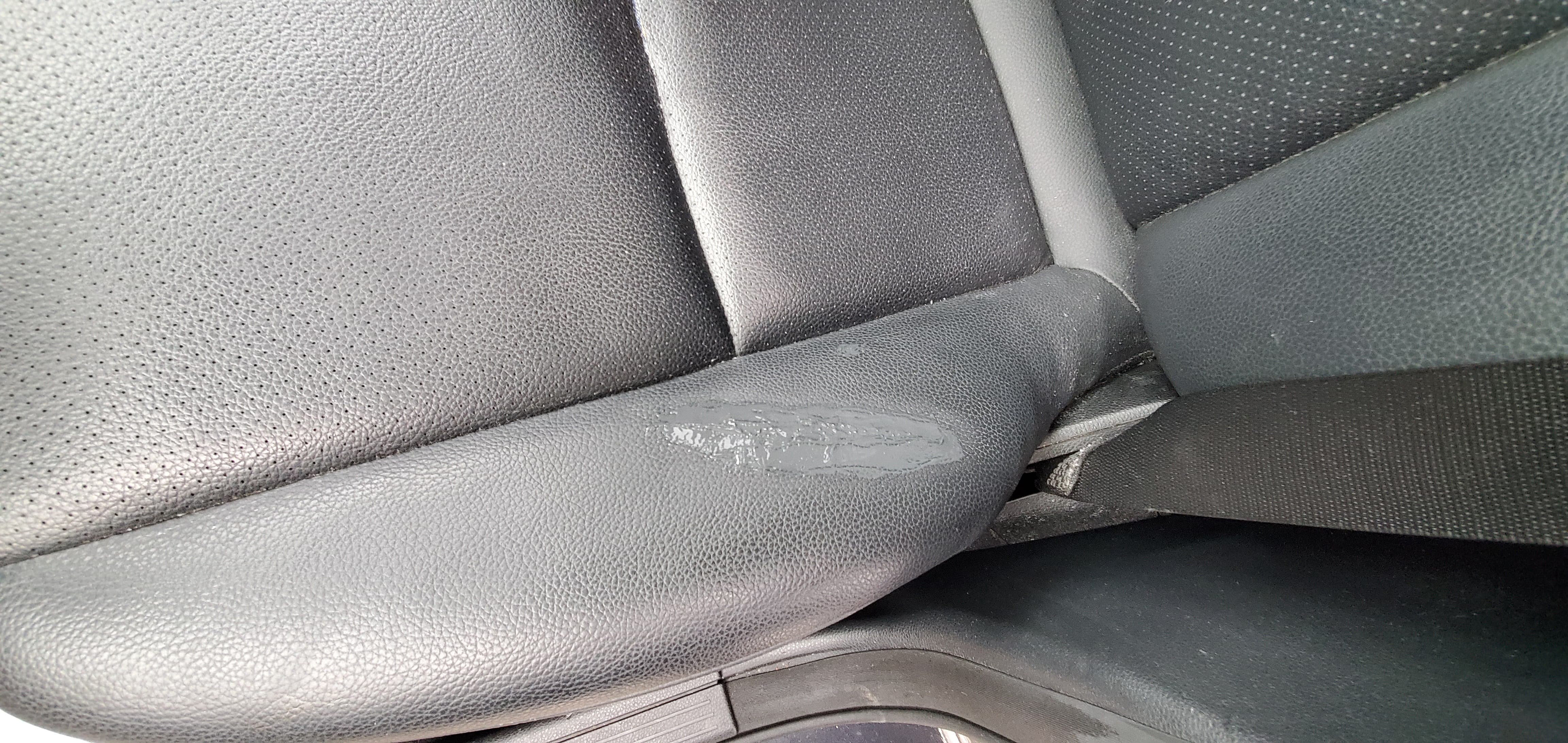 Applying color compound to a repaired leather car seat tear