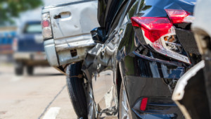 Car with front-end damage from hitting a pole, illustrating damage requiring more than minor repair work