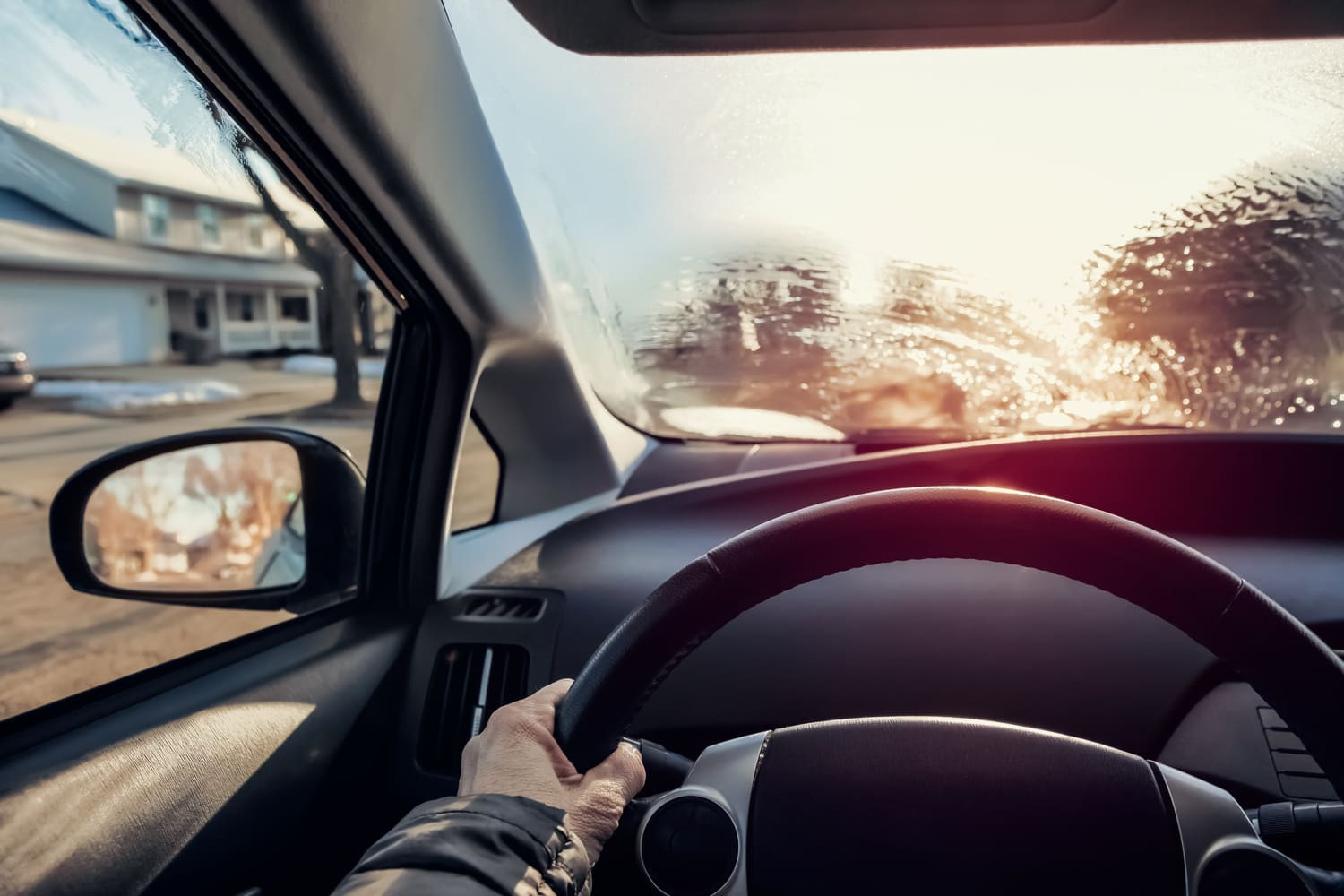 Foggy car window interior indicates potential water leak