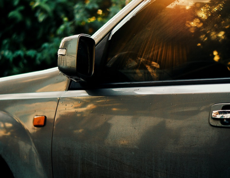 Car door replacement process at an auto body shop