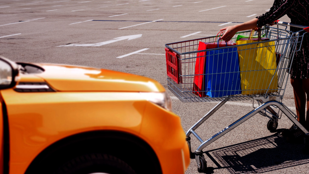 Car door with a minor dent caused by a shopping cart