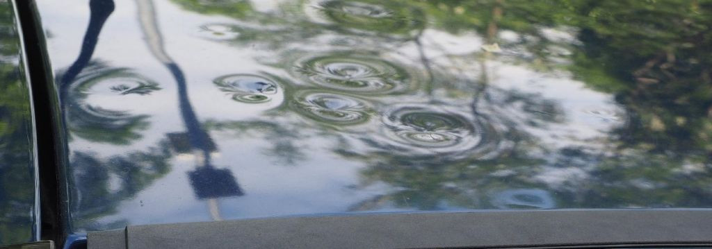 Polishing car scratch with microfiber cloth