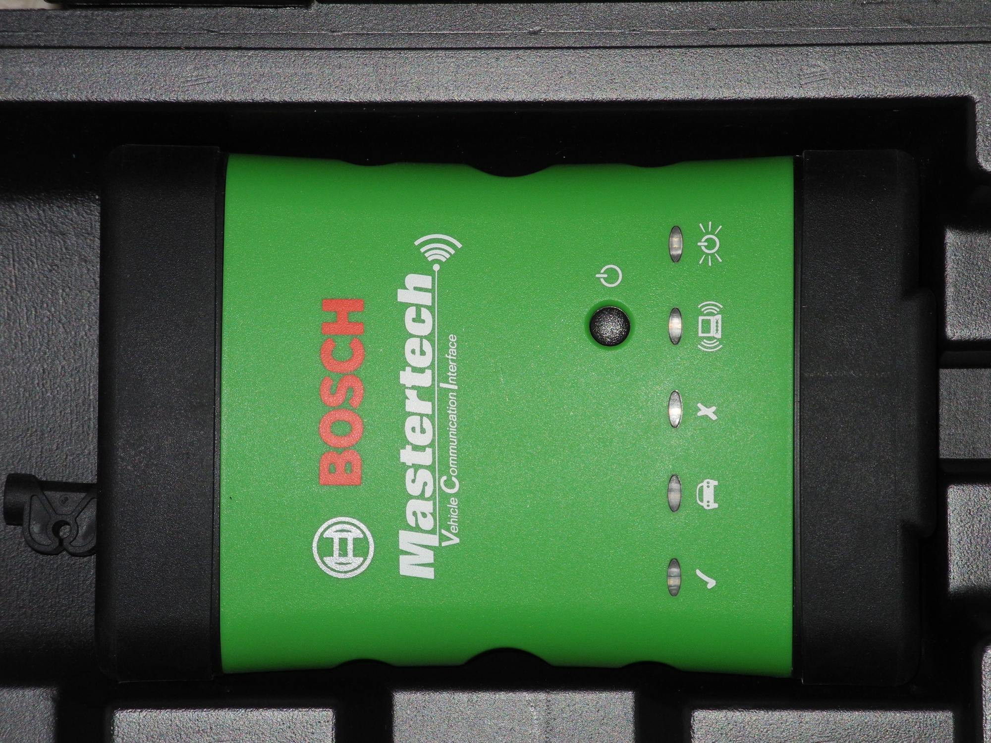 Close-up of the Bosch Mastertech VCI interface, clearly showing its robust connectors and compact design, ideal for reliable J2534 communication.