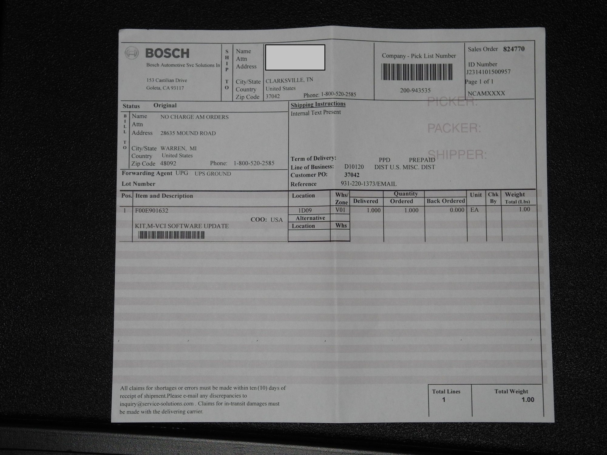 Image displaying the Bosch Mastertech VCI with its power adapter, confirming the inclusion of necessary accessories when you buy J2534 diagnostic tools.