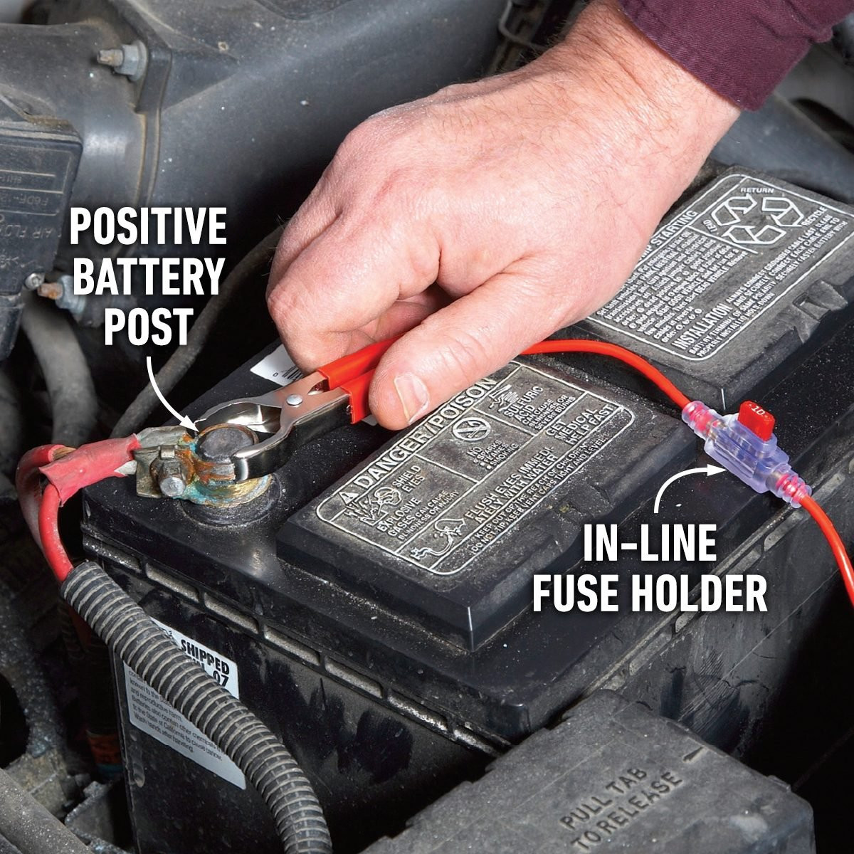 Inspecting car horn wiring connections for corrosion, a step in how to fix a horn on a car.