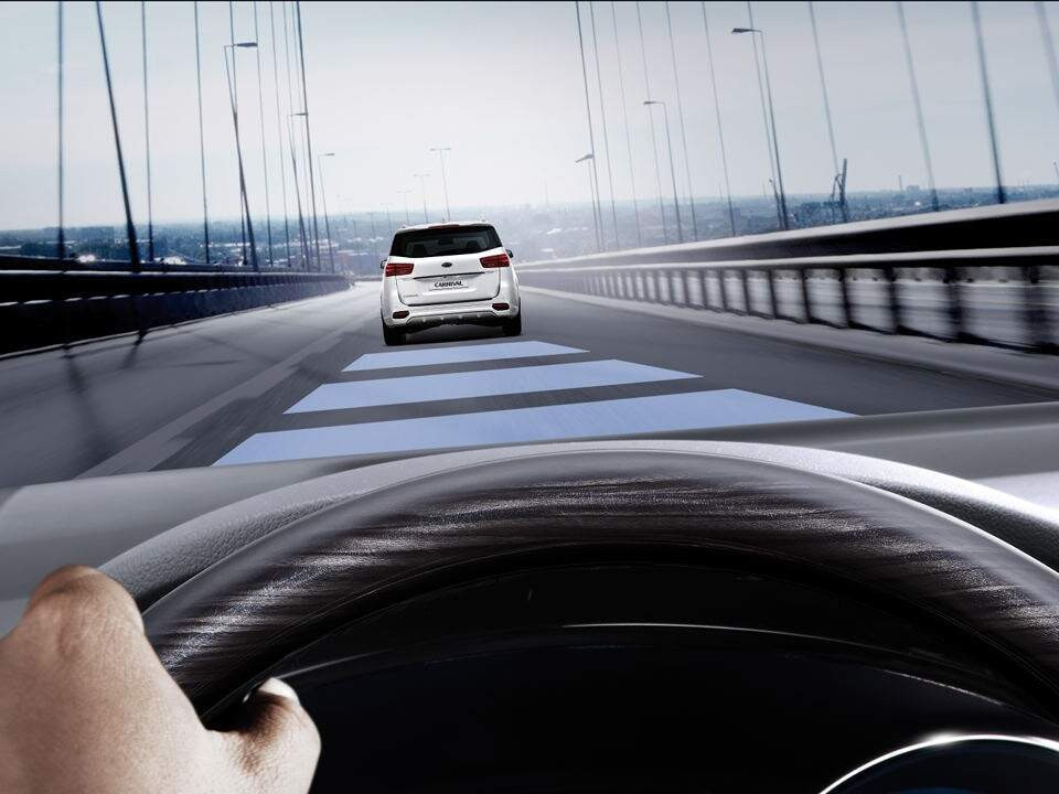 Dashboard view of cruise control buttons and speedometer