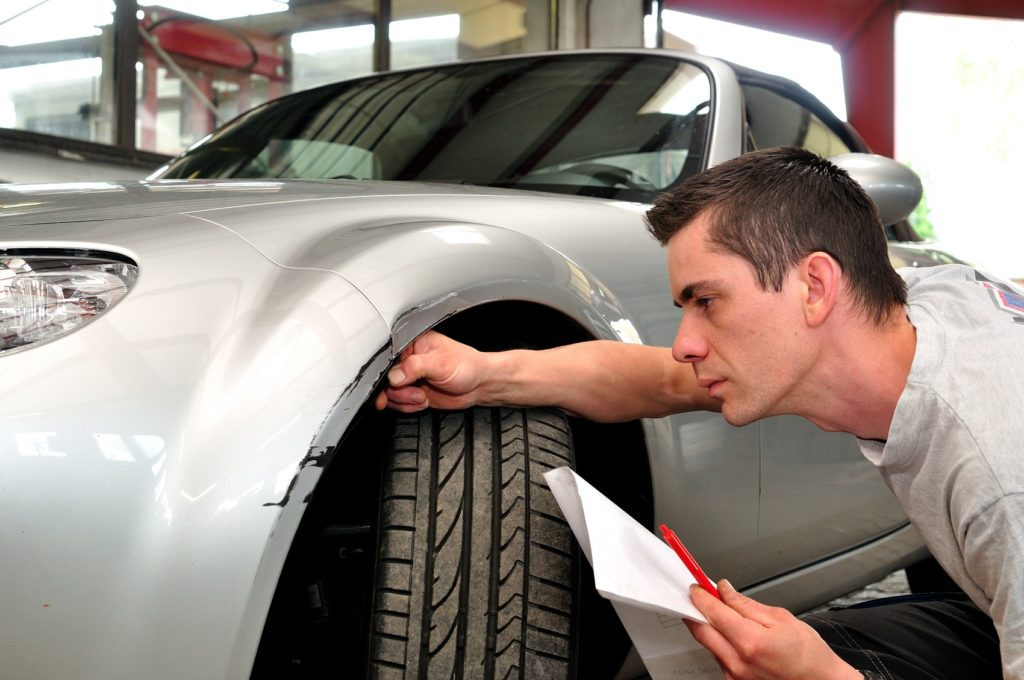 Inspecting car bumper clips for damage