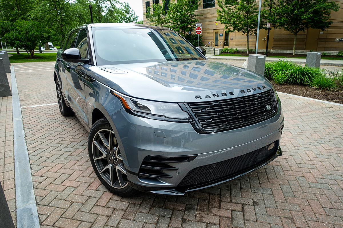 Front view of the 2024 Range Rover Velar highlighting its floating grill and sculpted design