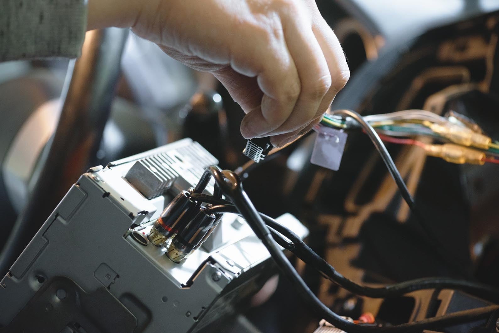 Car radio wiring diagram, illustrating the complexity of automotive audio systems and potential wiring problems